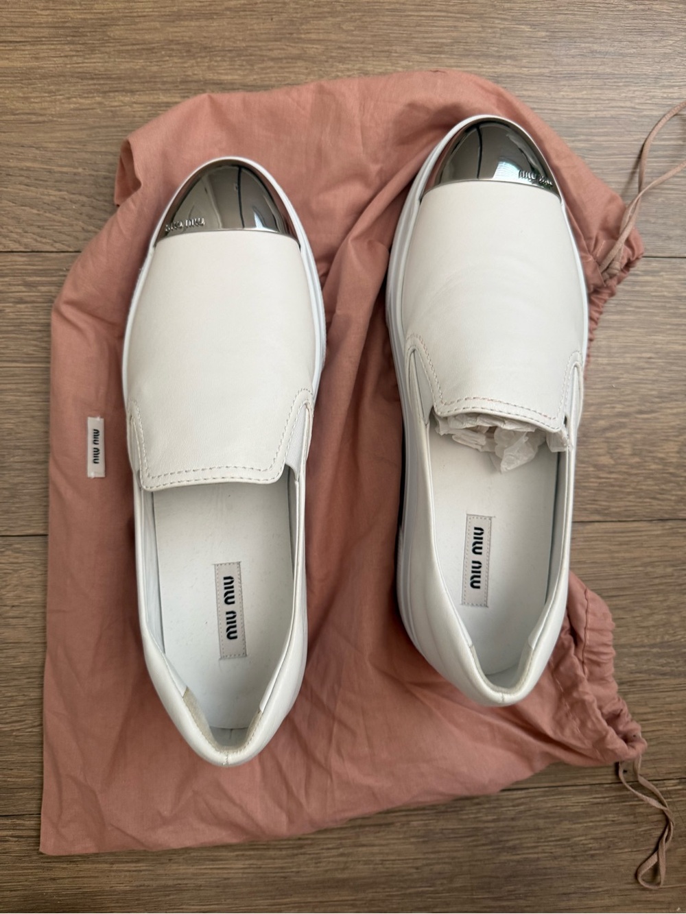 Miu Miu White Leather Slip-On Sneakers with Silver Toe Detail